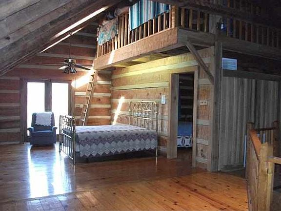 this is the second floor with the sm loft above bedrm.