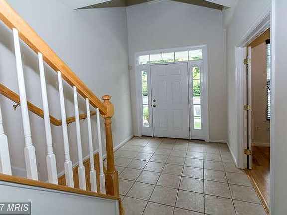 Main level foyer with ceramic tile floor.