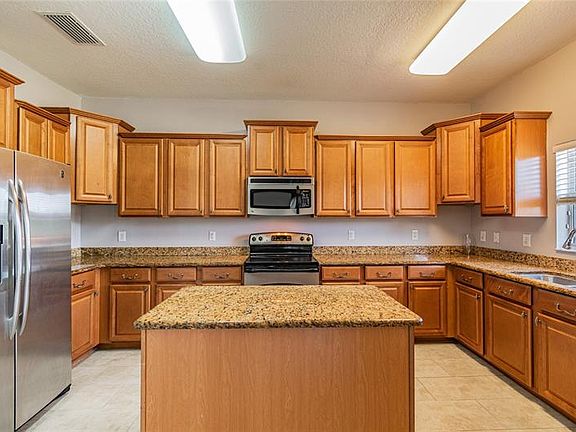 5th image of 8016 Alamosa Wood Ave