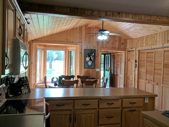 Kitchen with large table seats 6+ and counter seats 4