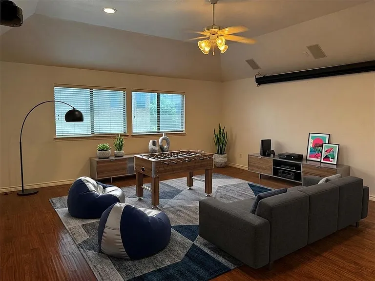 Virtually Staged as a game room or media room!