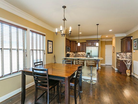 The open layout is perfect for entertaining! Guests can flow easily from room to room.
