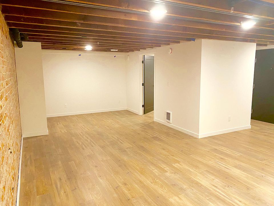 Open living space with exposed brick