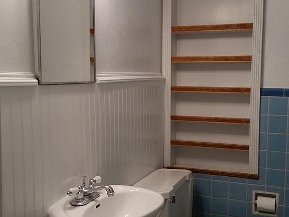 Bathroom has a linen closet/drawers not shown.