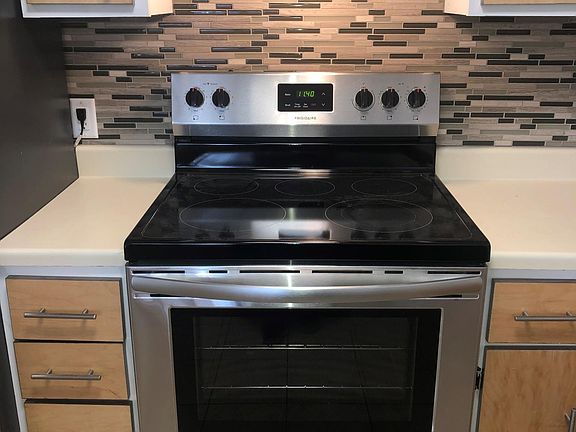 New tile backsplash and hood and oven
