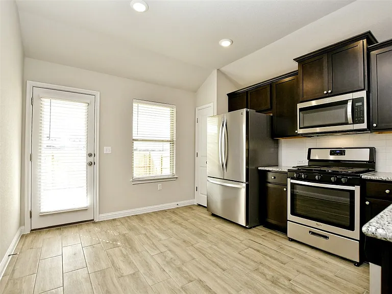 8205 Cottage Rose Dr — Photo 11