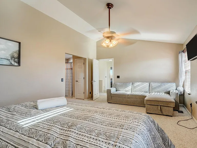 Master bedroom has a pull out couch and a TV!