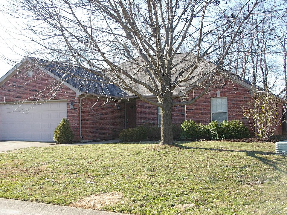 All brick ranch with a large lawn and beautiful ash tree. Two car attached garage. Close to 1-265, shops, restaurants, and groceries.