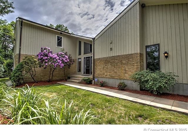 Beautiful 4 bedroom 3 full bath contemporary home situated on 2 private acres!