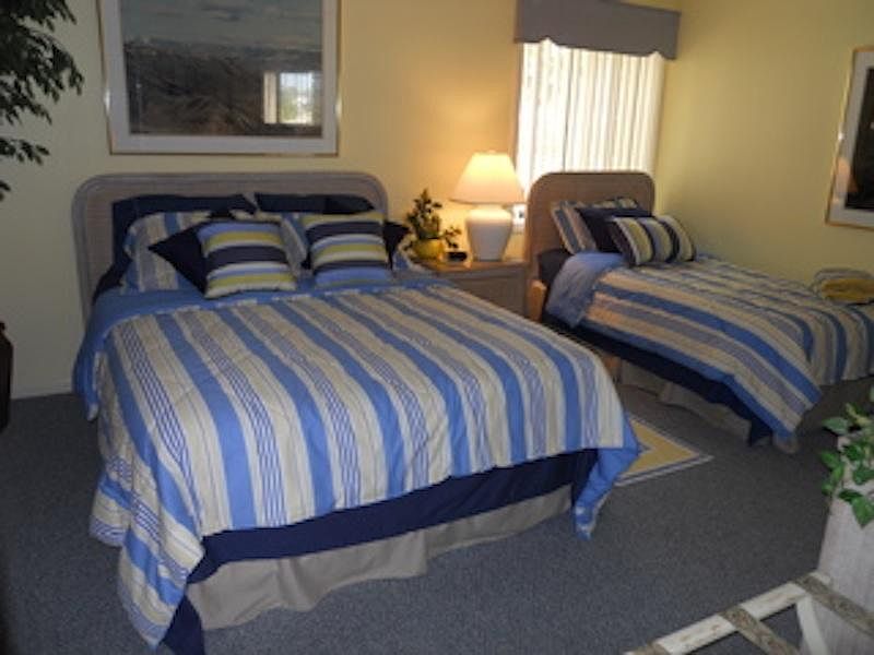 Bedroom has 1 queen & 1 twin bed