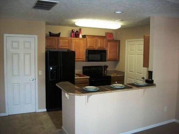 Kitchen with black applia
