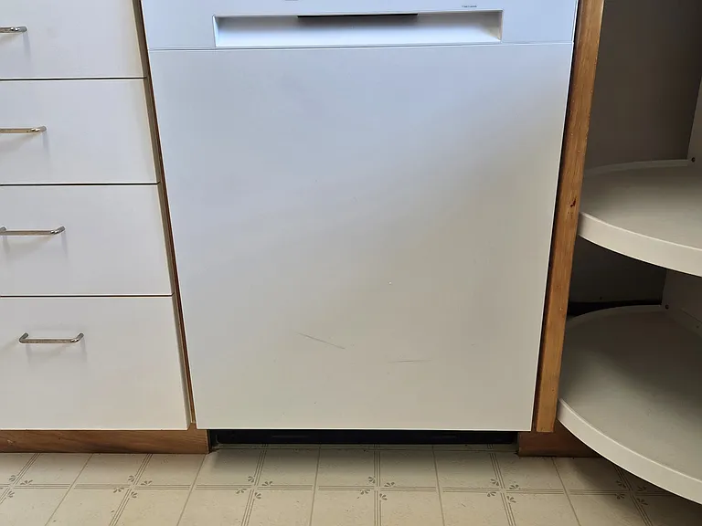 New LG dishwasher and rotating corner cabinet shelves.