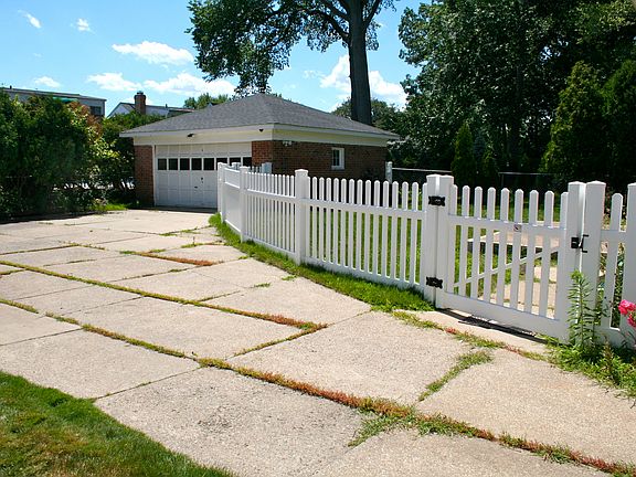 Detached garage with plenty of additional parking
