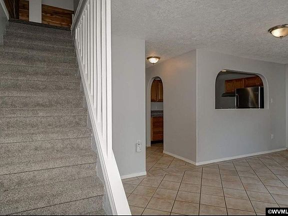 Upstairs is another bedroom. To your left is the front bedroom.