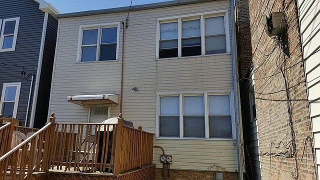 1st image of 3857 N St Louis Ave