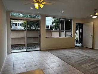 View from the kitchen to dining room and living room looking towards front patio