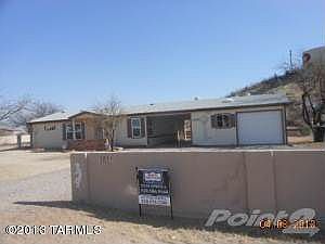 Front of House with carport & Garage