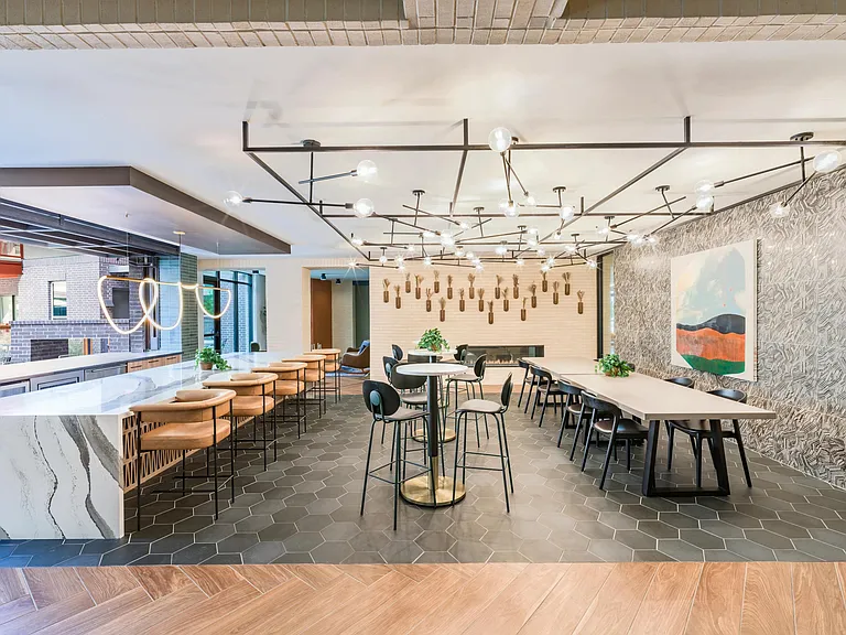 Connect and unwind in the social kitchen at Modera EaDo, designed for gathering and creating memories.