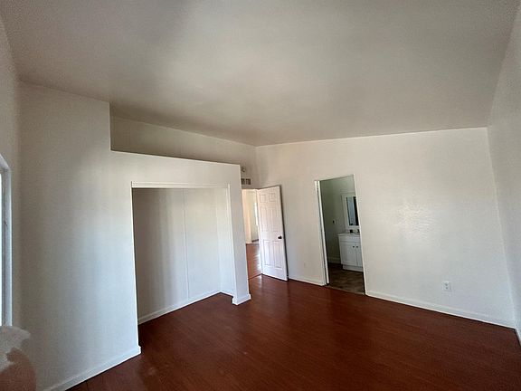Master bedroom & bath. Closet has storage area on top of it