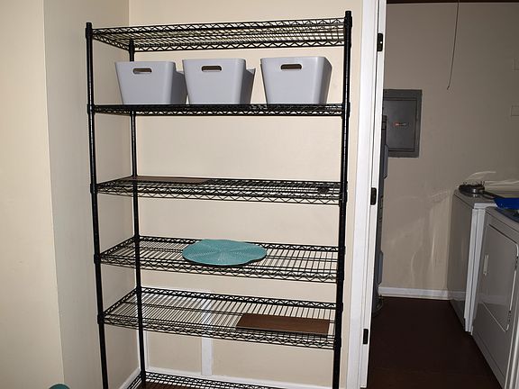 Extra vinyl clad shelving in kitchen area - Put your Kitchen Aid, larger pans, extra linens, or pantry items here!
