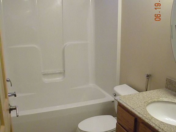 Bathroom with granite vanity and natural light!