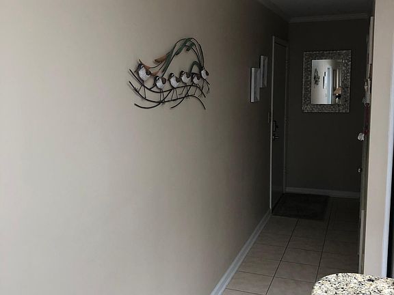 View from den area looking towards entry door.
