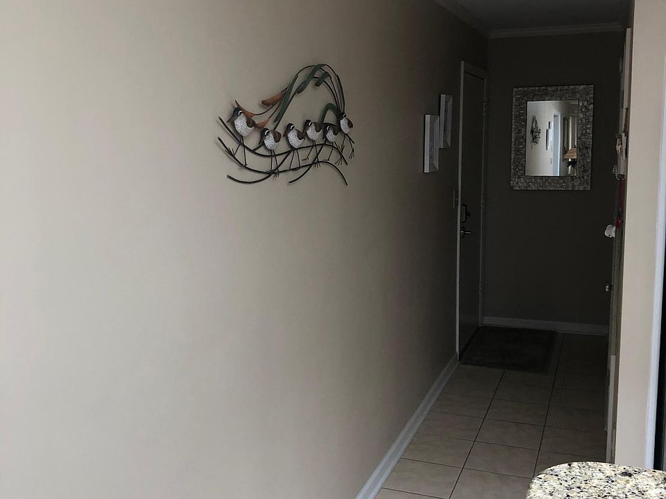 View from den area looking towards entry door.