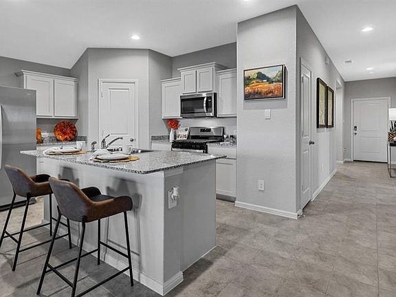 Kitchen - All Home and community information, including pricing, included features, terms, availability and amenities, are subject to change at any time without notice or obligation. All Drawings, pictures, photographs, video, square footages, floor plans, elevations, features, colors and sizes are approximate for illustration purposes only and will vary from the homes as built.
