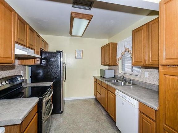 4th image of 6616 Woodland Blvd N