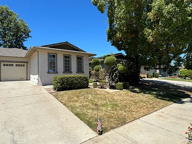 Designed with the feel of a single family home. Units are attached by garages.
