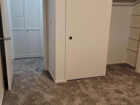 Second bedroom, off laundry room window to front of house.