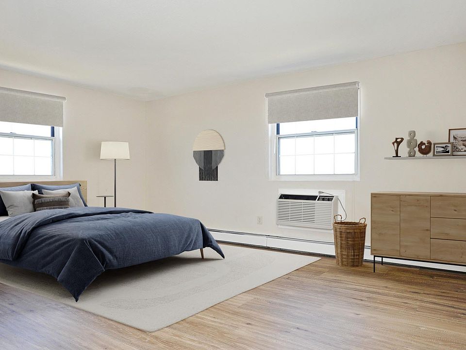 Bedroom with wood flooring and a large closet