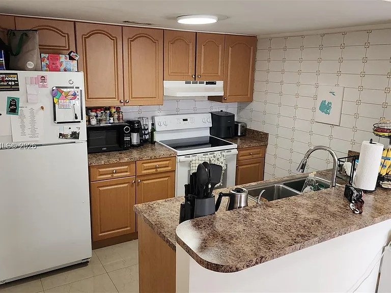 4540 SW 68th Court Cir #48-7 — Photo 14
