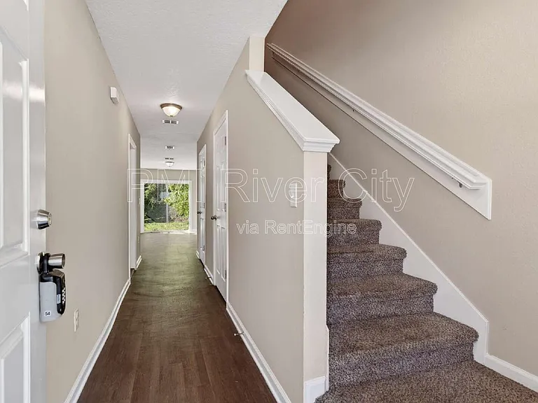7608 Rain Forest Dr N — Photo 8