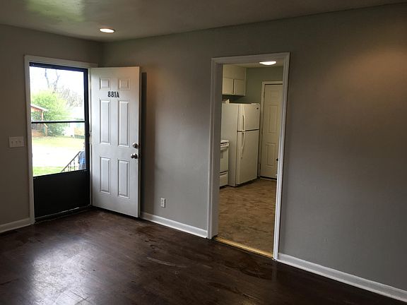 Living room & kitchen off front entrance
