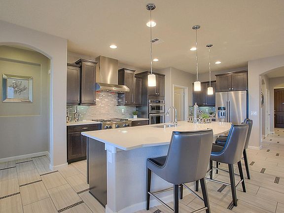 Whip up delicious meals in the gourmet kitchen.