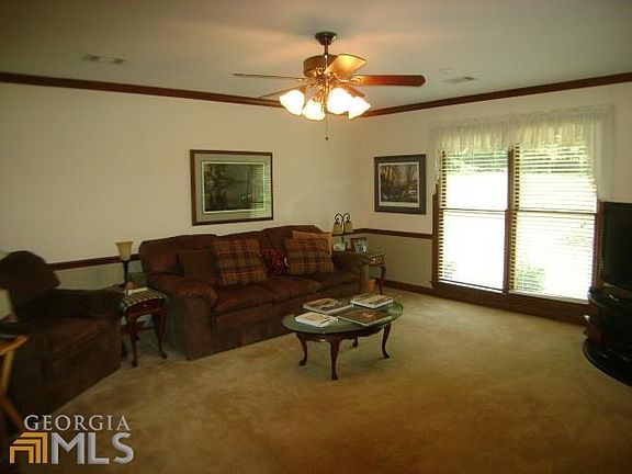 DEN/LIBRARY - HAS EXIT TO COVERED PATIO