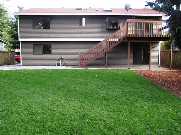 Large backyard is perfect for summer BBQ's.