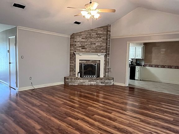 Spacious Living Room. Front Door to the Left. Kitchen / Breakfast to the Right