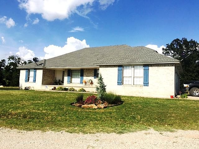 BEAUTUL HOME WITH 25 ACRES