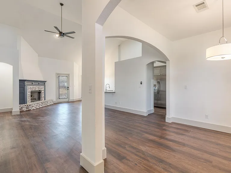 Front Door Opening to Dining Room - Living Room and Kitchen Area