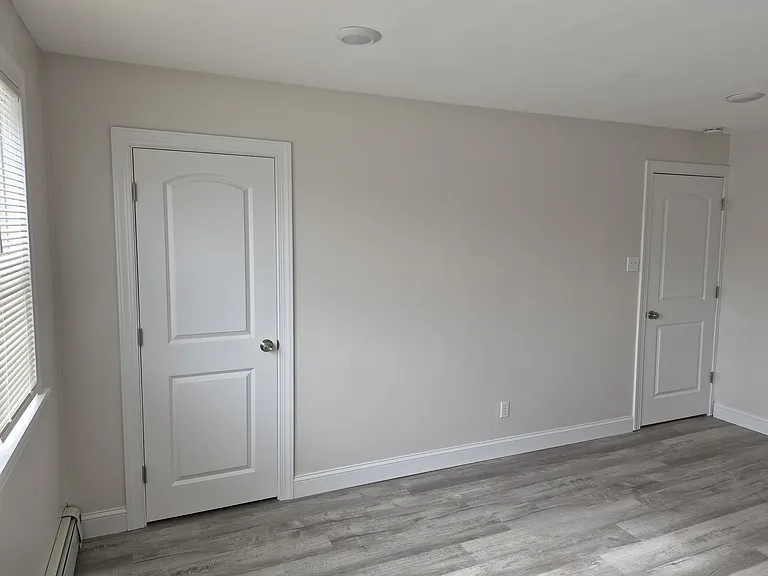 Living Room with Coat Closet