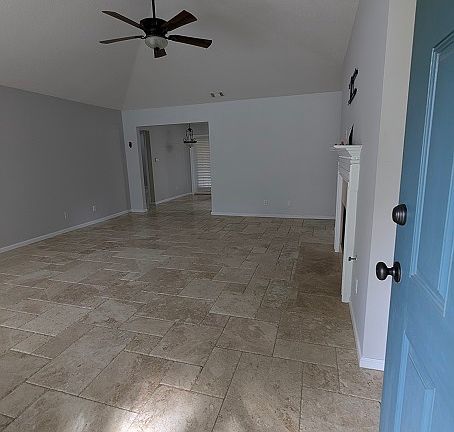 VIEW OF LIVING ROOM FROM FRONT ENTRY