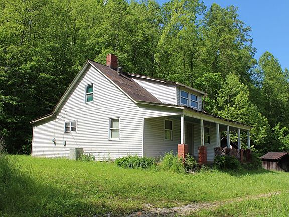 View of the country home from the driveway entrance