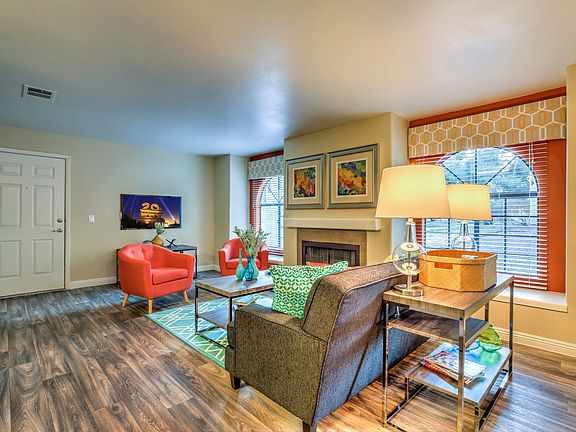 Living room with window seating and fireplace
