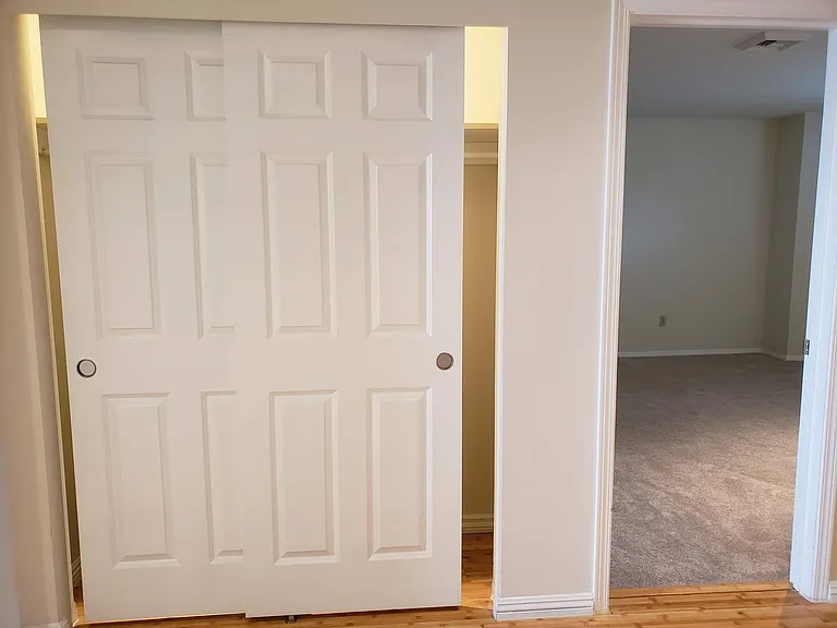 Hall Closet and View to Master Bedroom