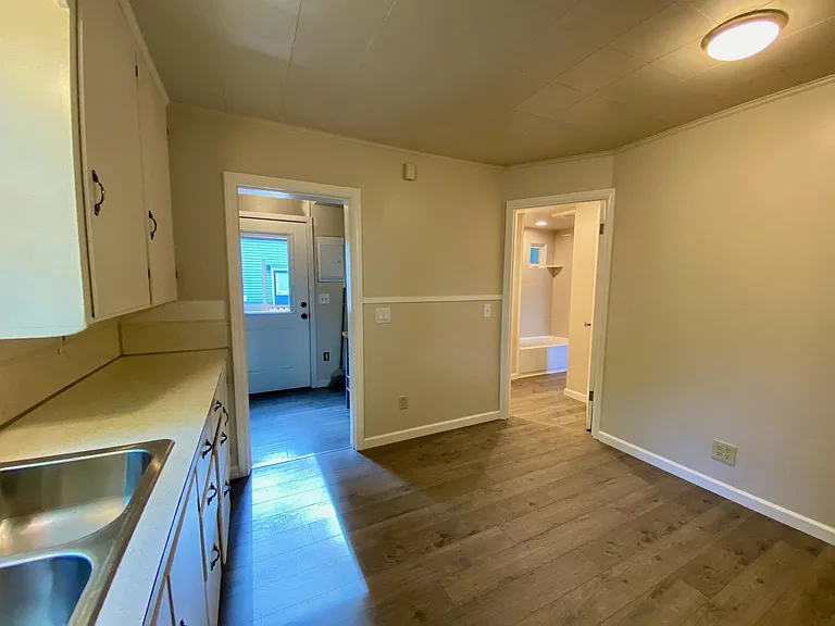 Kitchen looking at the Entry / Mudroom and the bath.