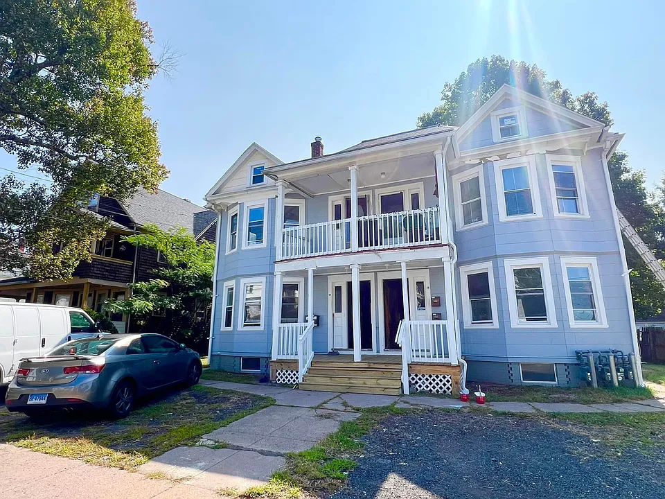 2 spaces on each side & street parking in front