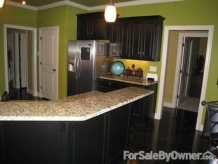 Living Room
						:
						Cable hidden behind TV over fireplace that is connected in the coat closet