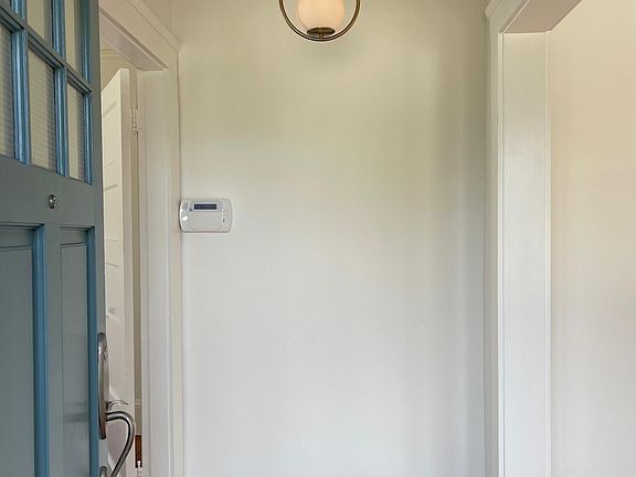 Entry. The front bedroom is immediately to the left, the living room is to the right.